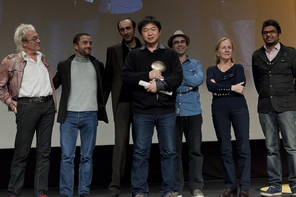 Cérémonie de clôture, Montgolfière d'or pour Wang Bing (Three Sisters)
