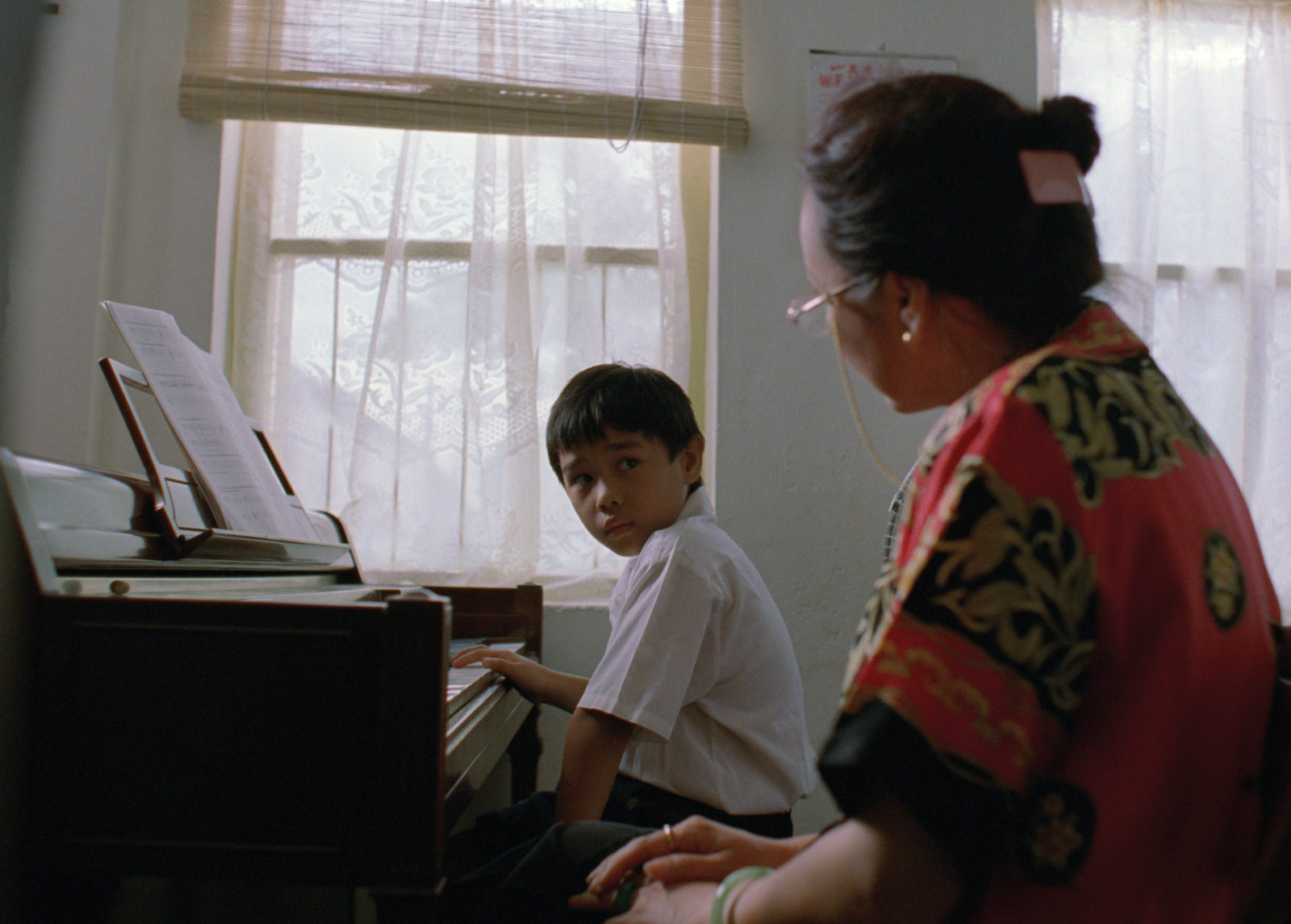Piano-teacher-and-boy